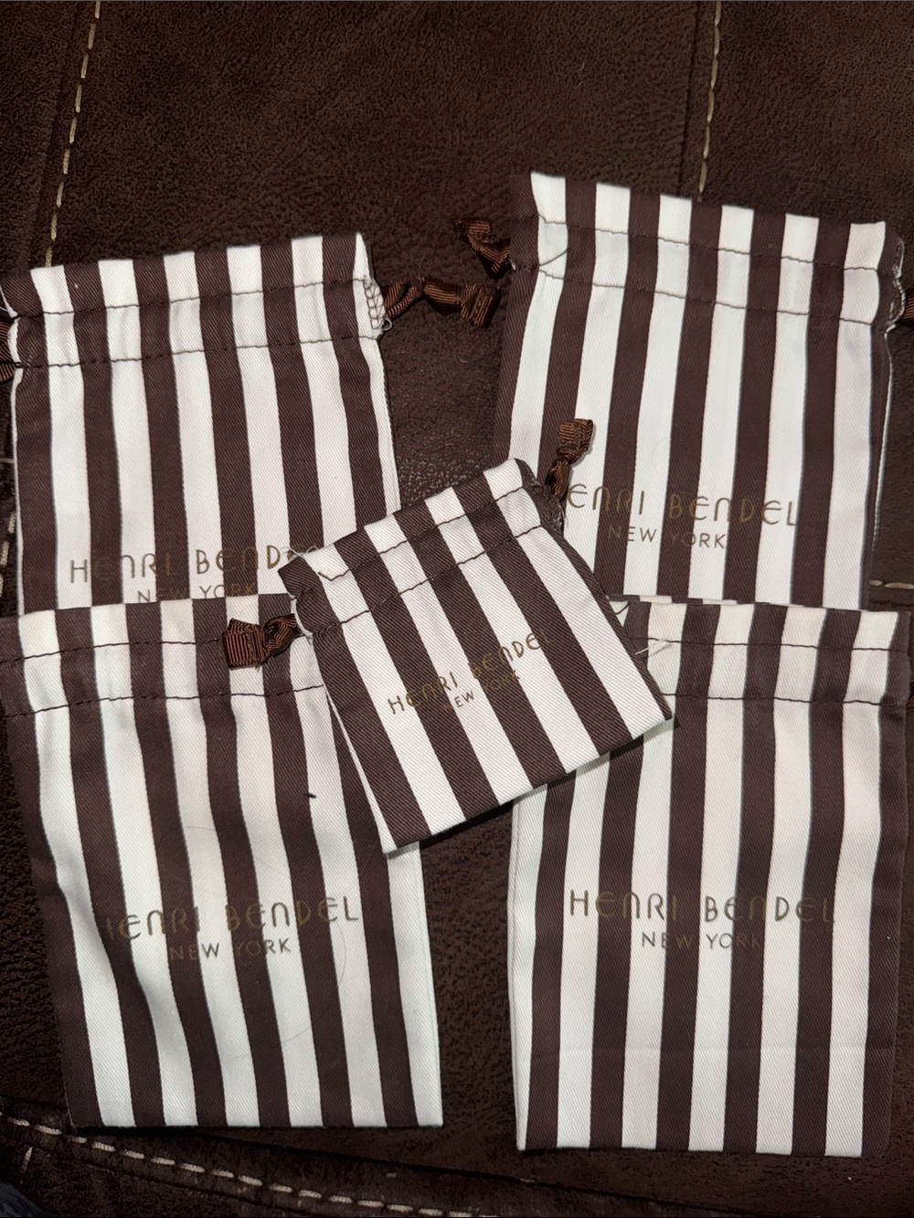 Henri Bendel jewelry drawstring bags (5 total)